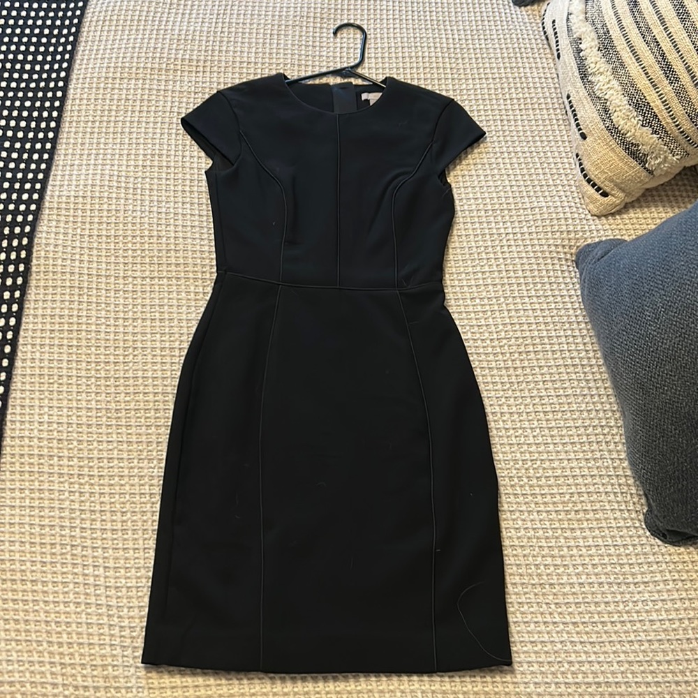 Like new H&M black womens size 2 fitted zip back office mini dress
